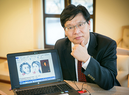 Dr. Yi-Bing Lin showing his drawings of Russian historical figures